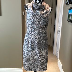 Fabulous animal print high neck dress w/fitted waist & invisible zip down back.